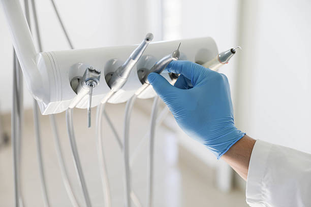 Professional Tooth Extraction technician working in Cleveland County County, AR